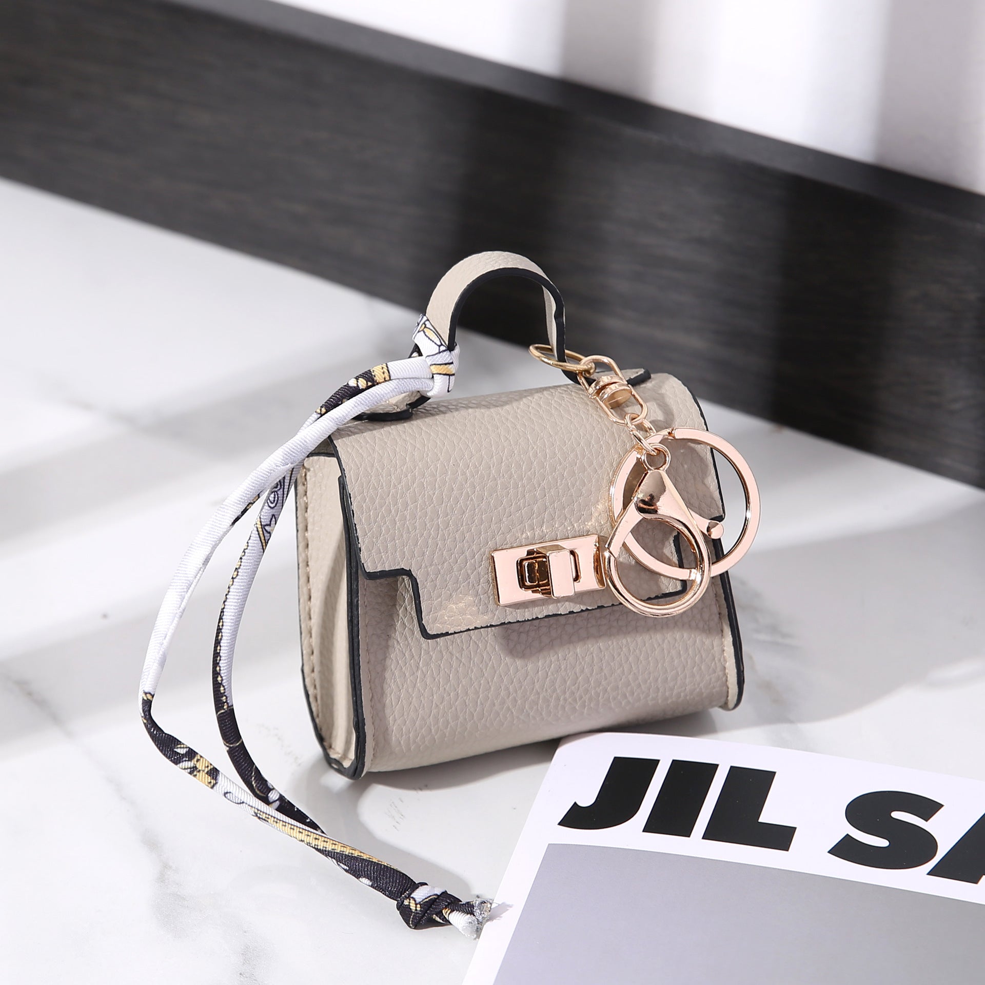 Taschenanhänger Mini-Organizer Kunstleder Drehverschluss – Bild 12